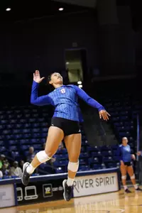 volleyball player hitting a volleyball