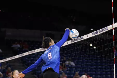 volleyball player hitting a volleyball