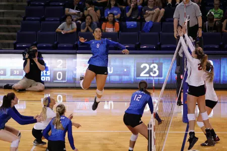 volleyball player hitting a volleyball