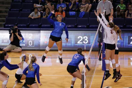 volleyball player hitting a volleyball