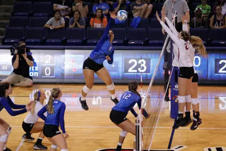 volleyball player hitting a volleyball