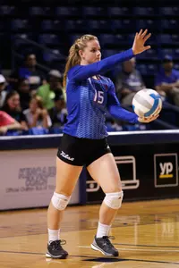 volleyball player hitting a volleyball
