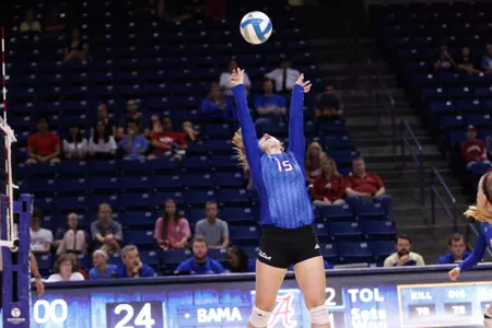 volleyball player hitting a volleyball
