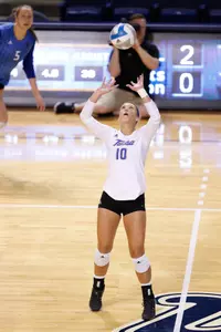 volleyball player hitting a volleyball