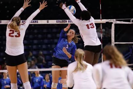 volleyball player hitting a volleyball