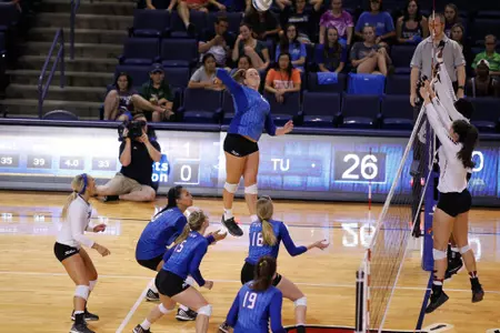 volleyball player hitting a volleyball