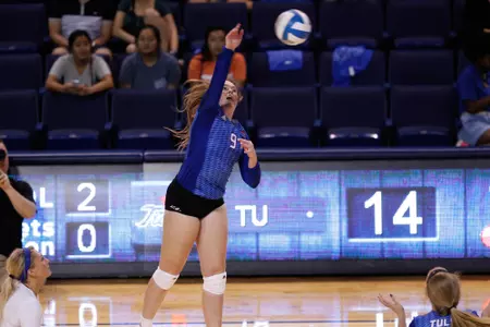 volleyball player hitting a volleyball