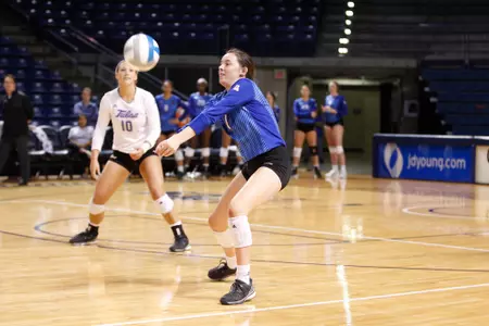 volleyball player hitting a volleyball