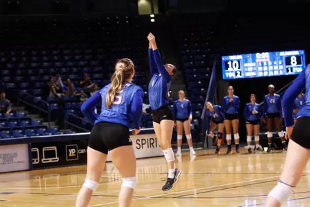 volleyball player hitting a volleyball