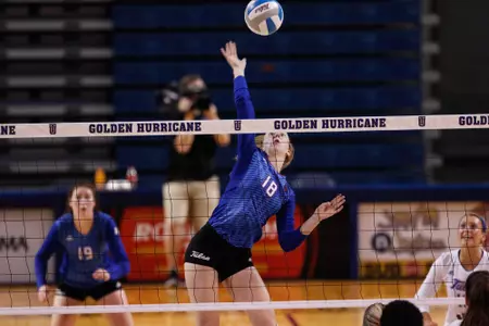 volleyball player hitting a volleyball