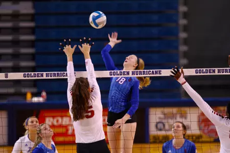 volleyball player hitting a volleyball