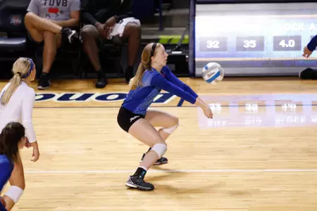volleyball player hitting a volleyball
