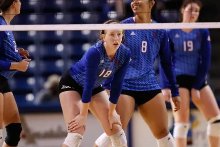volleyball player hitting a volleyball
