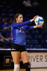 Pardo hitting a volleyball
