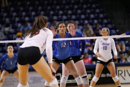volleyball player hitting a volleyball