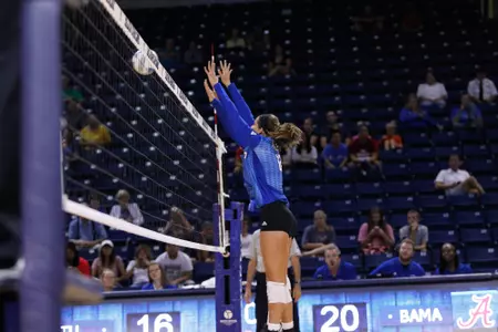 volleyball player hitting a volleyball