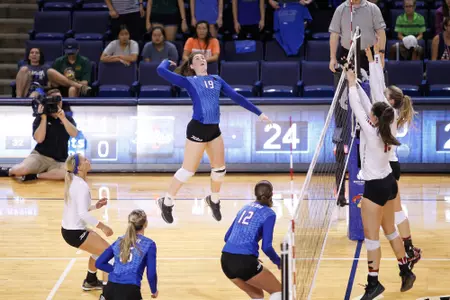 volleyball player hitting a volleyball