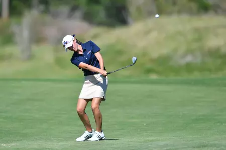 Greta Bruner hitting a golf ball