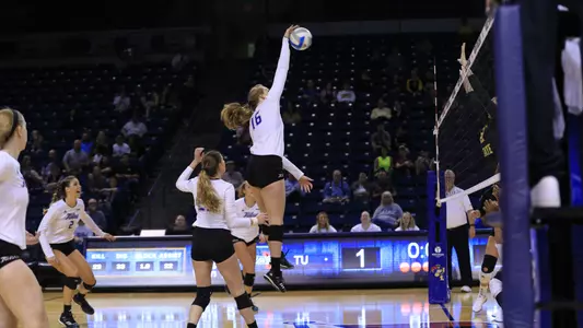 volleyball player hitting the ball