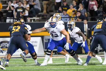 Tyler Bowling playing football