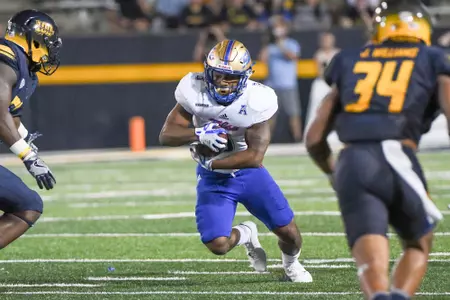 Shamari Brooks running the football