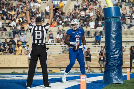 Tulsa's tight end Chris Minter looks back towards the referee after scoring a touchdown during the game against Navy at H.A. Chapman Stadium in Tulsa, OK on 9/30/17.  BRETT ROJO/For the Tulsa World