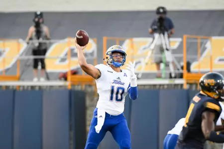 Chad President throwing the football