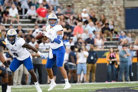 Chad President throwing the football