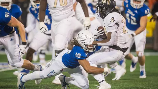 Manny Bunch tackles a UCF runner