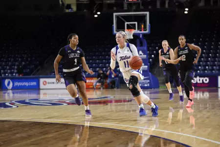 Maddie Bittle playing basketball