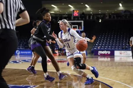 Maddie Bittle playing basketball