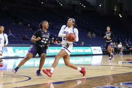 Rebecca Lescay playing basketball