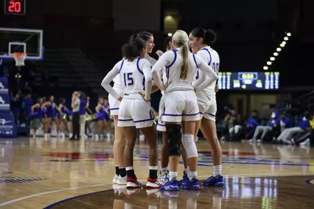 2019-20 women's basketball team huddle