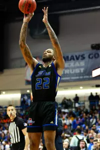 Reggite Jones playing basketball