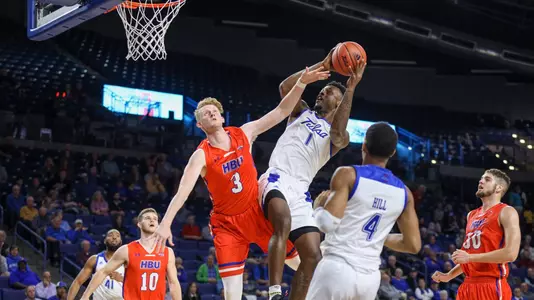 Martins Igbanu puts up a shot against HBU