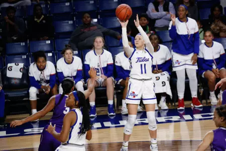Maddie Bittle playing basketball