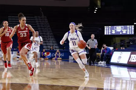 Maddie Bittle playing basketball