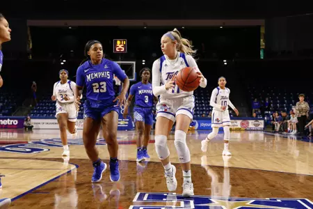 Maddie Bittle playing basketball