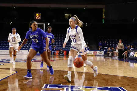 Maddie Bittle playing basketball