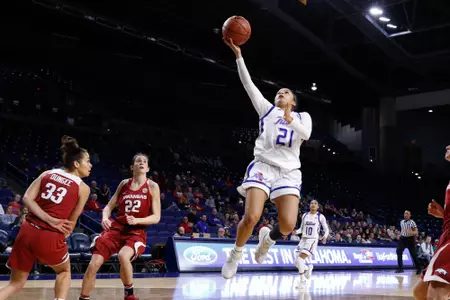 Rebecca Lescay playing basketball