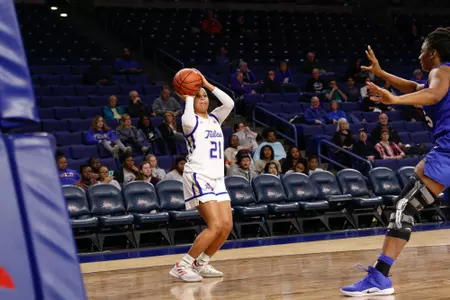 Rebecca Lescay playing basketball