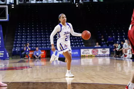 Rebecca Lescay playing basketball