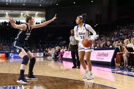 Rebecca Lescay playing basketball