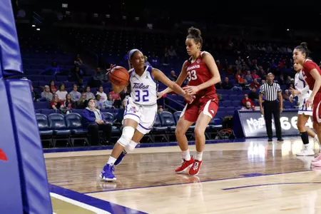 Desiree Lewis playing basketball
