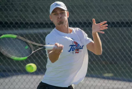 Kody Pearson hitting ball at Oracle ITA National Fall Championships