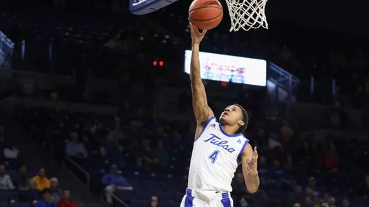 Isaiah Hill scores a layup