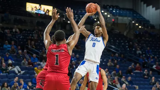 Brando Rachal shoots over a defneder