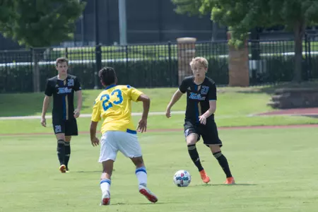 Ben Barkley kicking a soccer ball