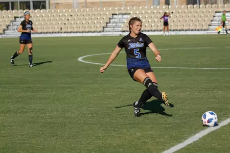 Emily Brandenburg playing soccer