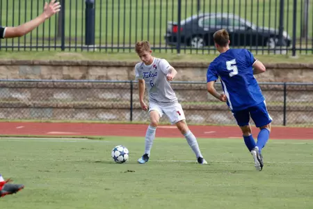 Chase Bromstedt kicking a soccer ball